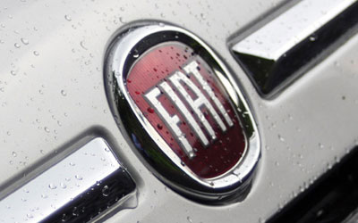 Fiat exercises option to buy additional 3.3% of Chrysler shares